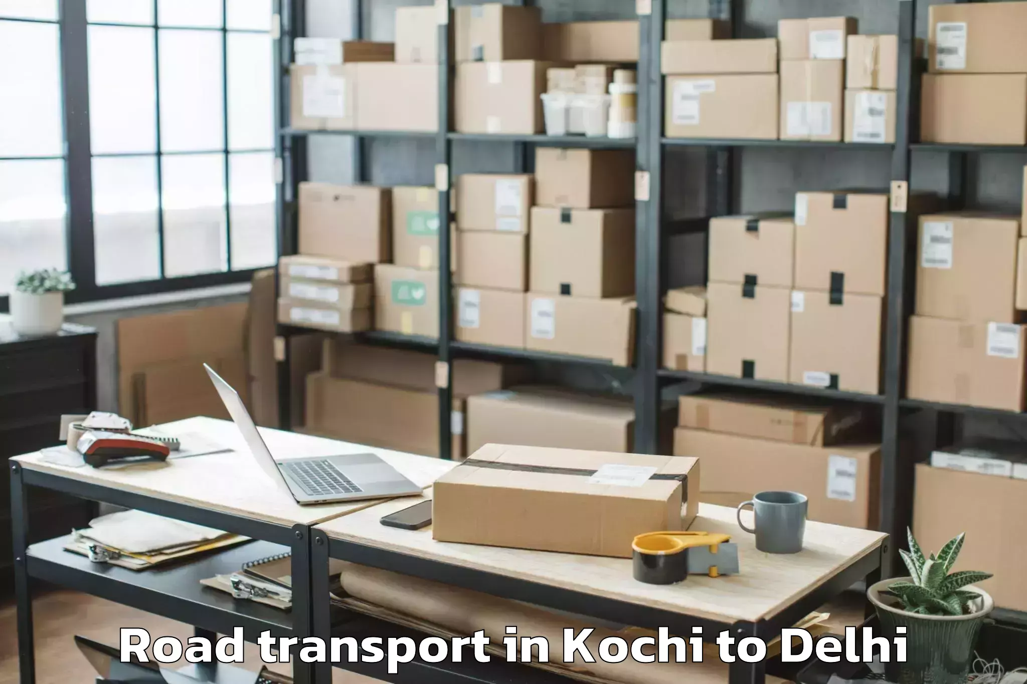 Book Kochi to Defence Colony Road Transport Online